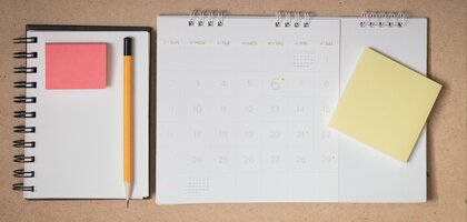 calendar, notebook, pencil, post-it notes